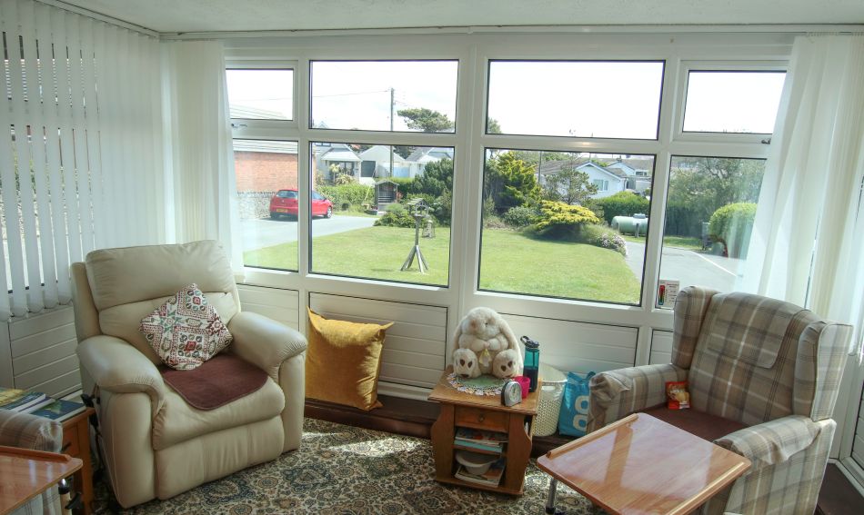 Comfortable individual bedroom in an elderly residential care home in Anglesey